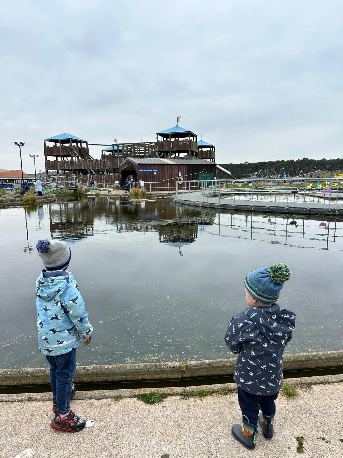 Child painting on an outdoor easel